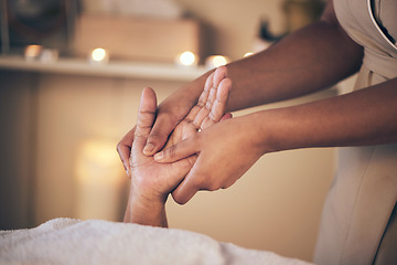 Image showing Woman, hands and massage in relax for spa treatment, body care or physical therapy at the resort. Closeup of female person holding hand for stress relief, comfort or zen in healing or reiki at salon