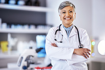 Image showing Senior scientist, woman with arms crossed and portrait, science study for medical research in laboratory. Biotechnology, confident female doctor with scientific experiment and future with smile