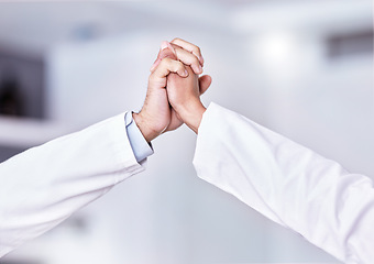 Image showing Doctors, teamwork and hands together for support, collaboration and healthcare motivation, goals and faith. Hope, love and hand holding of medical people with high five sign and clinic celebration