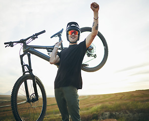 Image showing Mountain bike, man and celebrate success outdoor in nature for sports training or workout. Winner, fist and excited male person with bicycle for off road cycling, travel or adventure in countryside