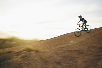 Image showing Mountain bike, downhill and man outdoor in nature for sports training and fast speed. Adrenaline, blur and male athlete person with bicycle for off road cycling, travel or adventure on a hill