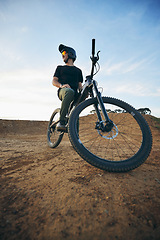 Image showing Fitness, extreme sports and man with a mountain bike, training or competition with a challenge. Male person, athlete or cyclist with nature, cycling or exercise with adventure, performance or journey