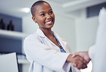 Image showing Black woman, scientist and handshake, smile for partnership and science collaboration with introduction in lab. Congratulations, thanks or onboarding with hiring, doctor team shaking hands and trust