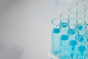 Image showing Blue chemical in test tube, science and closeup with mockup space, medical research and chemistry in lab. Scientific study, experiment and biotechnology with liquid solution in glass container