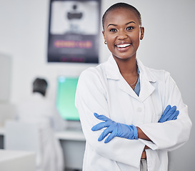 Image showing Scientist, black woman and happy in portrait, arms crossed with medical research and science study in laboratory. African female doctor, pathology or biotech, scientific experiment and confidence