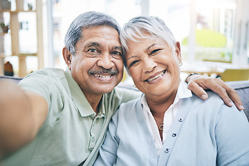 Image showing Selfie, home and senior couple with love, hug and retirement with marriage, bonding and quality time. Portrait, happy old man and elderly woman embrace, social media and profile picture with romance