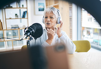 Image showing Senior woman with podcast, host on broadcast or social media influencer with mic, headphones and home studio. Technology, communication and online radio show, live streaming with female web presenter