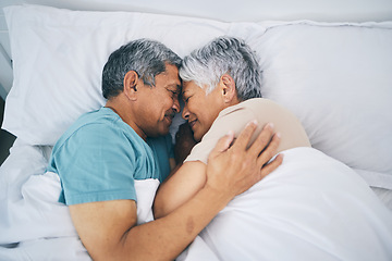 Image showing Top view, hug and senior couple in bed, relax and sleeping with happiness, quality time and loving together. Romance, old man or elderly woman embrace, bedroom and retirement with marriage and love