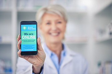 Image showing Woman, pharmacist and phone screen for advertising, online marketing or branding at pharmacy. Hands of female person, medical or healthcare professional show mobile smartphone app for advertisement