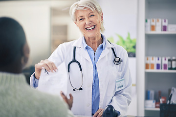 Image showing Happy woman, pharmacist and patient for prescription, consultation or quote at the pharmacy. Female person, medical or healthcare professional smile and giving customer doctors note for diagnosis