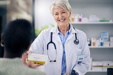 Image showing Happy woman, pharmacist and medicine box for patient, pills or prescription over the counter at pharmacy. Female person, medical or healthcare professional giving pharmaceutical product to customer