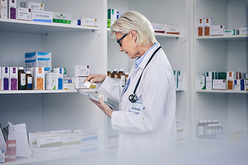 Image showing Professional chemist, woman and tablet with medicine for inventory with medical expert for research. Doctor, work and pharmacy with tech to check pills with online information on app for health care.