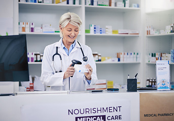 Image showing Mature pharmacist, woman and scanning pills, cashier with medicine and pharmacy, digital and stock barcode. Pharmaceutical store, tablet box and female person with health, service and retail commerce