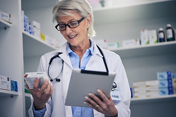 Image showing Old woman, pharmacist and tablet to check medicine stock in pharmacy, drugstore or shop. Medical professional, inventory and happy doctor with technology, pills and reading supplements for healthcare