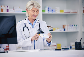Image showing Senior pharmacist, woman and scanning pills, cashier with medicine and pharmacy, digital and stock barcode. Pharmaceutical store, tablet box and female person with health, service and retail commerce