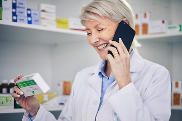 Image showing Happy woman, pharmacist and phone call with medication for telehealth, communication or advice at pharmacy. Female person, medical or healthcare expert talking on smartphone for online consultation