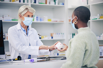 Image showing Senior pharmacist, women and pills, client and cashier with medicine in pharmacy, face mask and help. Pharmaceutical, tablet box and female people with health, safety and retail commerce with advice