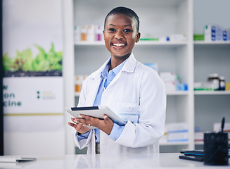 Image showing Pharmacy, tablet and black woman with checklist at counter for medicine, information and advice on drugs. Digital list, pharmacist or medical professional with online inventory for telehealth in shop