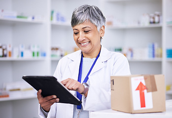 Image showing Senior woman, pharmacist and tablet for inventory inspection or stock in logistics at pharmacy. Mature female person in medical or healthcare checking pharmaceutical product checklist on technology