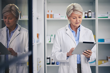 Image showing Senior woman, pharmacist and tablet for research, online healthcare and telehealth in pharmacy, drugstore or shop. Medical professional, technology and elderly doctor reading email for medicine app.