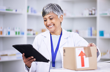 Image showing Happy woman, pharmacist and tablet in logistics with box for online order, delivery or shipping at pharmacy. Senior female person in medical healthcare for ecommerce or pharmaceuticals on technology