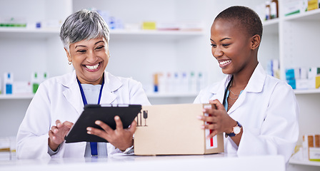 Image showing Happy woman, pharmacist and team with tablet and box in logistics for inventory inspection or stock at pharmacy. Women smile with technology, medical or healthcare supplies and pharmaceuticals