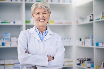 Image showing Portrait, senior pharmacist and woman with arms crossed in pharmacy, drugstore or shop for medicine. Smile, medical professional and face of doctor, healthcare expert and confident person from Canada