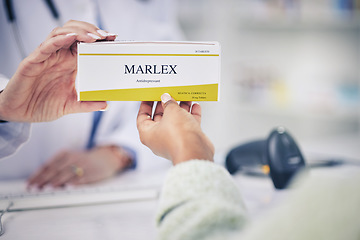 Image showing Woman, pharmacist and hands with box of pills for medication, cure or prescription on counter at pharmacy. Closeup of female person or doctor giving tablets or antibiotics for depression at drugstore