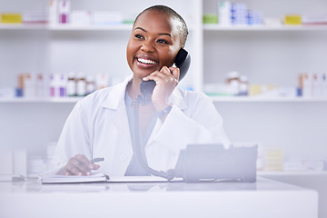 Image showing Black woman, pharmacist and phone call on mockup space for Telehealth or consultation at the pharmacy. Happy African female person, medical or healthcare professional talking on telephone at clinic