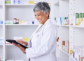 Image showing Happy woman, pharmacist and tablet for inventory inspection, stock or Telehealth at the pharmacy. Senior female person smile in medical or healthcare store for pharmaceutical checklist on technology