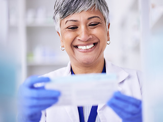 Image showing Happy, pharmacist or senior woman with medication, package and smile with treatment. Mature lady, female person or healthcare professional with happiness, medical or pharmacy with employee or reading