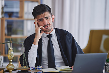 Image showing Portrait, laptop and stress with a man judge in his law office looking confused about a trial or verdict. Computer, doubt or question with a magistrate sitting at his desk for legal problem solving