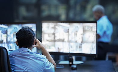 Image showing Security guard in control room, man checking cctv screen in surveillance office for building safety. Inspection, technology and video stream to monitor crime, privacy and night protection service.