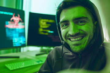 Image showing Cybersecurity, crime and smile, portrait of hacker in neon office with code, fraud and virus. Software, ransomware and face of happy man on cyber attack, password thief and online scam with computer.