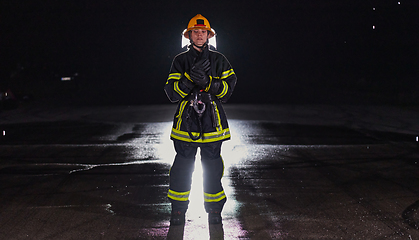 Image showing Portrait of a female firefighter standing and walking brave and optimistic