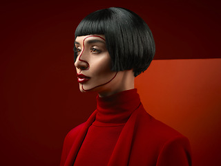 Image showing Woman, red aesthetic and studio profile with makeup art, thinking and ideas with couture, vision and background. Girl, model and high fashion with suit, mindset and paint on face for cosmetic beauty