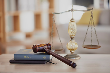 Image showing Background, gavel and law books with scales on table of judge, attorney and court trial. Closeup of legal hammer, notebook or desk of lawyer in constitution, equality and human rights of fair justice