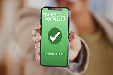 Image showing Hands, person and phone screen with transaction completed for ecommerce, finance or digital money. Closeup, smartphone and payment received on mobile, online shopping app or fintech financial service