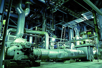 Image showing Equipment, cables and piping as found inside of a modern industr