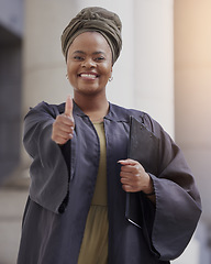 Image showing Woman, lawyer and portrait with thumbs up at the court for justice, success and confidence of leader or judge on law case. Happy, agreement and working in legal advice, building or courthouse