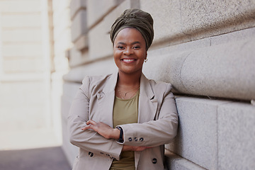 Image showing Lawyer, happy and black woman is confident in city with vision or empowerment in career. Smile, portrait and african female attorney with crossed arms at job as advocate outside courtroom or agency.