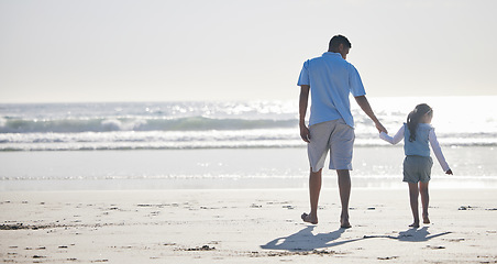 Image showing Beach, holding hands and dad and kid walking for outdoor wellness, nature freedom and fresh air on Brazil holiday. Ocean sea water, mockup view and back of family, father and youth child bonding