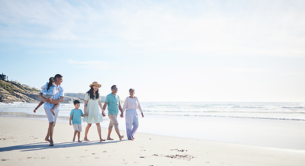 Image showing Beach, walking and grandparents, parents and kids by sea for bonding, quality time and relax in nature. Family, travel mockup and mom, dad and children by ocean on holiday, vacation and adventure