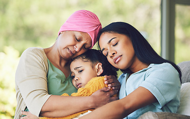 Image showing Sad, hug and cancer with a family in a house for support, care and love on living room sofa. Unhappy, chemotherapy and mother and child with sick grandmother for help, hope and solidarity at hospice