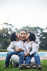 Image showing Park, kiss and portrait of mother and children for bonding, quality time and affection outdoors together. Happy family, relax and kids with mom in nature embrace for care, loving relationship and joy