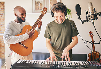 Image showing Happy, piano and friends with guitar recording music in home studio together. Electric keyboard, acoustic instrument or microphone of singer in band, headphones and team of men in production of sound