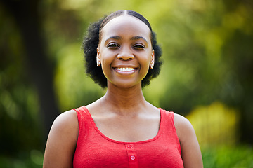 Image showing Portrait, happy and black woman in park, outdoor and garden with natural confidence, good mood and freedom in Nigeria. Face, african female person and smile for summer holiday or relax in nature