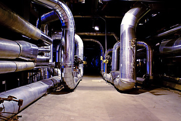 Image showing Pipes, tubes, machinery and steam turbine at a power plant 