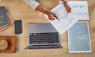 Image showing Lawyer, hands and laptop with divorce settlement agreement and attorney plan notes in a office. Desk, top view and law firm with contract and paperwork for report and document with information