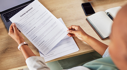 Image showing Family lawyer, hands and custody contract with attorney case and notes with agreement in a office. Desk, top view and law firm with planning and paperwork for divorce and document with child support